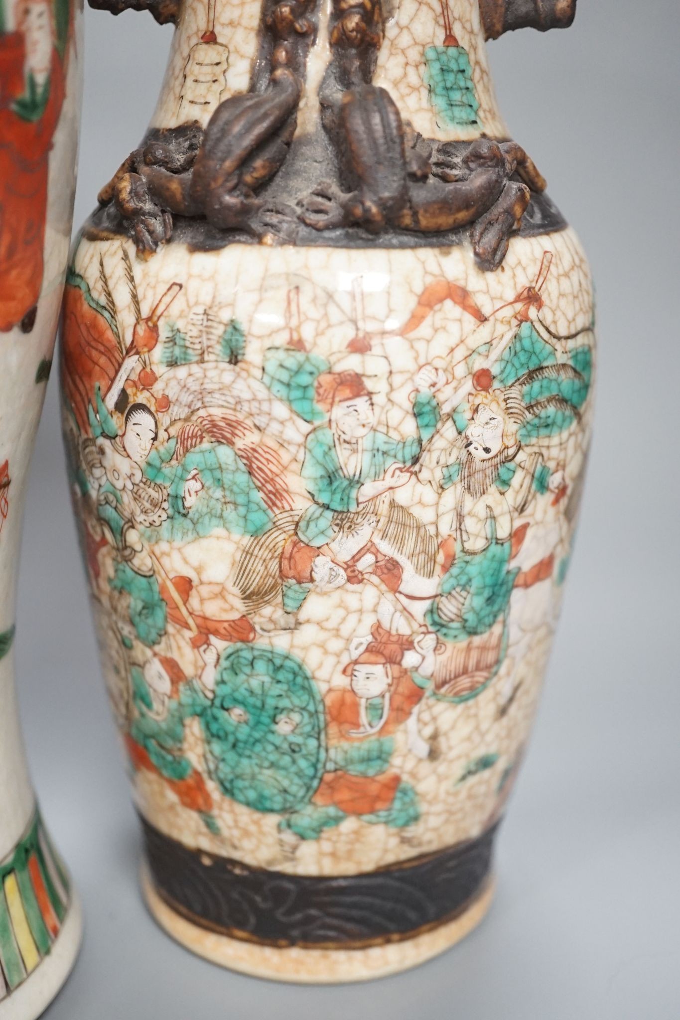 A pair of Chinese crackle glaze vases, a similar vase and cover, and another, late 19th/early 20th century (4), tallest 29 cms high.